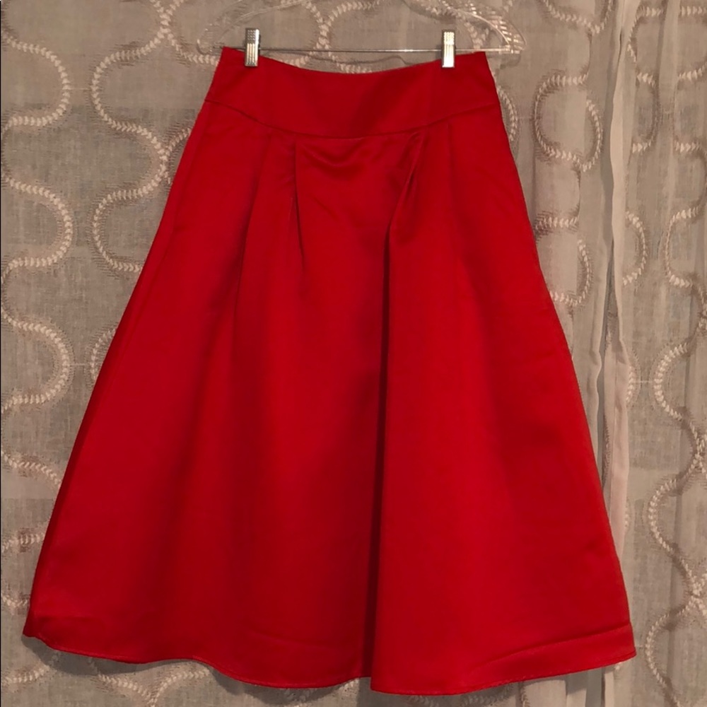 Midi-length red skirt